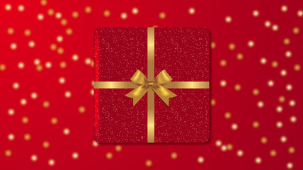 Fototapeta premium Elegant luxury present gift box with gold ribbon bow over red background with confetti. Christmas, New Year, Father day, Mother day, Valentine's Day, greeting card.