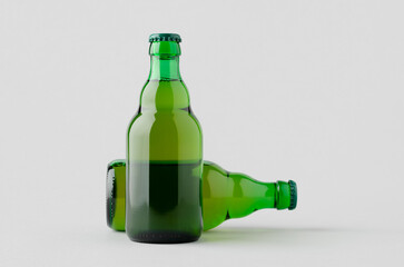 Green steinie beer bottle mockup on a grey background.