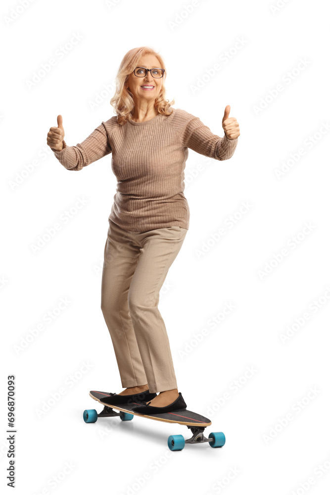 Poster mature woman riding a skateboard and getsuring thumbs up