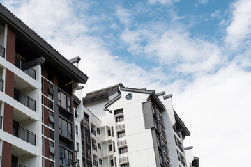 Obraz premium Modern apartment buildings with Chinese style rooftops