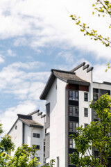 Modern apartment buildings with Chinese style rooftops