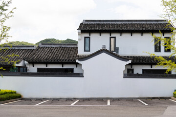 Parking lots outside Chinese style buildings