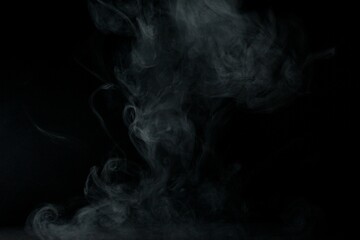 Abstract smoke misty fog on isolated black background. Texture overlays. Design element.