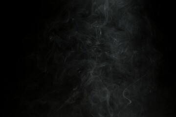 Abstract smoke misty fog on isolated black background. Texture overlays. Design element.