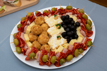 delicious appetizers, canapés, finger food and beautiful food on a platter, servnig platter