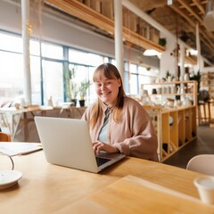 Inclusive Entrepreneurship: Joyful Young Woman with Down Syndrome Thrives in Co-working