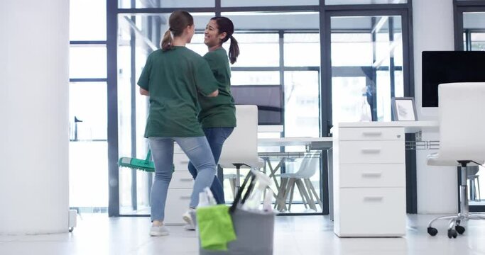 Women, cleaning office and dancing with mop, service and happy for job, coworker and hygiene. Workers, working and smile for disinfection, fun and enjoy together as colleagues, bacteria and janitors