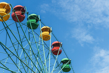 old colorful ferris wheel on a sunny day in armenian yerevan park