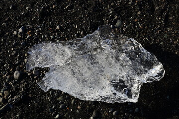 View on a iceberg on the Diamond Beach located south of the Vatnajökull glacier between the...