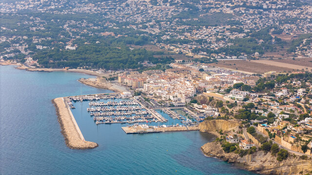 Aerial drone view of the marina in the coastal town named Moraira Spain