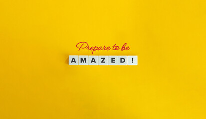 Prepare to Be Amazed Banner. Block Letter Tiles and Cursive Text on on Yellow Background....