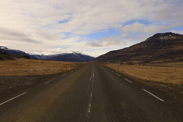 View on a road in the Fáskrúðsfjörður fjord located in the east of Iceland, in the Austurland region