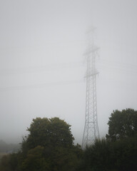 Grid tower in fog