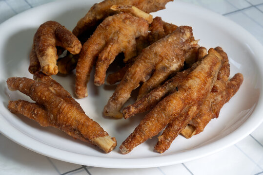 fried chicken feet on a plate