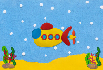 submarine in under sea with coral seaweed stone background made from plasticine