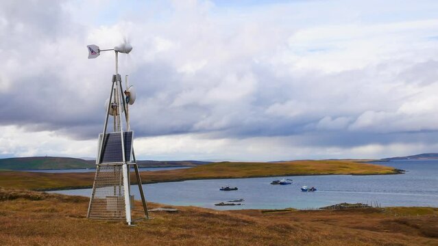 A solar and wind turbine powered microwave data relay station on open moorland on Lunna Ness, Shetland, Scotland, UK