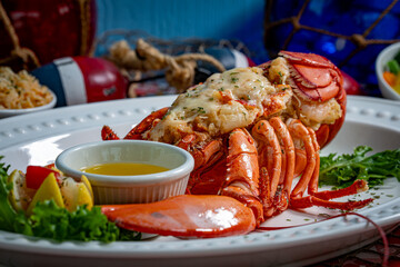 Baked stuffed lobster with drawn butter