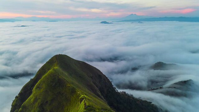 Cerro Eramon in Chalatenango, El Salvador hyperlapse during dawn, low clouds, foggy weather.