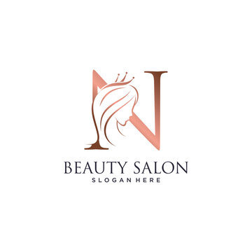 Woman beauty logo design vector illustration with letter n and crown icon