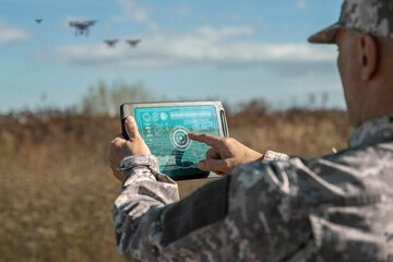 Army technologies. Warfare analytic operator checking coordination of the military team with...