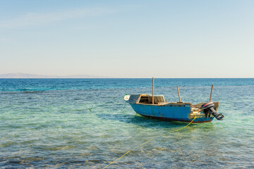 Old wooden fishing boat in the red sea in egypt.