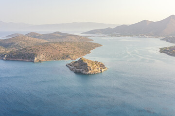 Aerial view by drone of idyllic seascape with small mediterranean island.