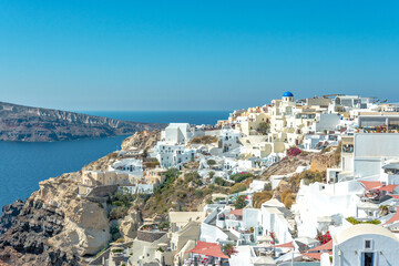 Obraz premium View of Oia town with white houses on Santorini island. Greece.