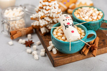 Snowman made of marshmallows.Cocoa drink.Sweet treat for kids funny marshmallow snowman. Christmas winter holiday decoration. New Year card.Winter hot drink.