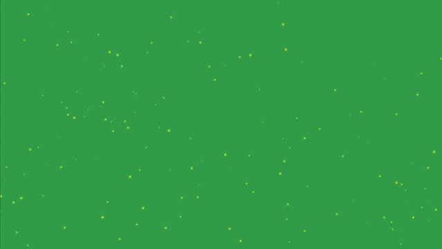 Drifting luminous stars glittering against a green screen with alpha transparency