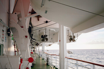 Structure of a ship on an open deck, a view of a lifeboat on a cruise ship. Safety on a Passenger...