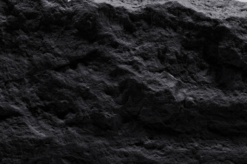 Black stone texture, dark abstract background. Natural mineral rock close up details, empty...