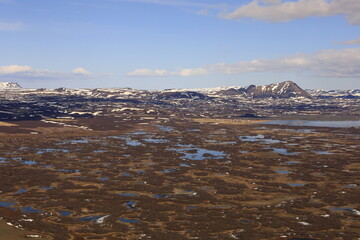 Mývatn is a shallow lake located in an area of active volcanism in northern Iceland, near the Krafla volcano