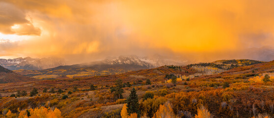 Panoramic Dallas Divide Rain Cloud Sunrise Over Colorado Scenic Landscape. Warm Golden Nature.