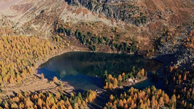 Aerial 4K, autumn panoramic view of Viola Lake in di Campo valley near Poschiavo in Switzerland	