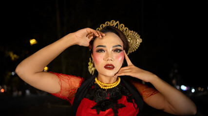 An Indonesian dancer becomes an ambassador of cultural beauty and elegance by dancing on stage