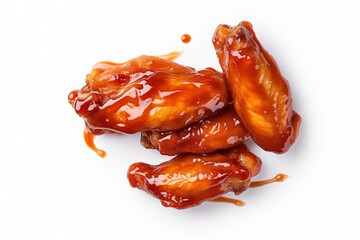 chicken wings cooked glazed, hot chilli sauce or teriyaki, isolated on white background, selective focus, streaks