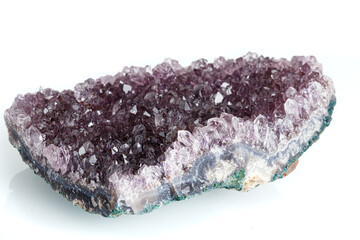 Amethyst mineral stone macro on white background