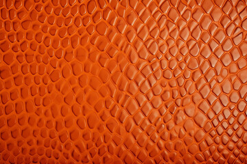 snakeskin orange leather texture of texture, empty background for design