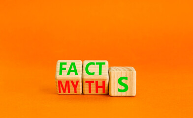 Facts or myths symbol. Concept word Myths and Facts. Beautiful orange table orange background....