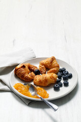 MIni croissats with apricot jam and fresh blueberries
