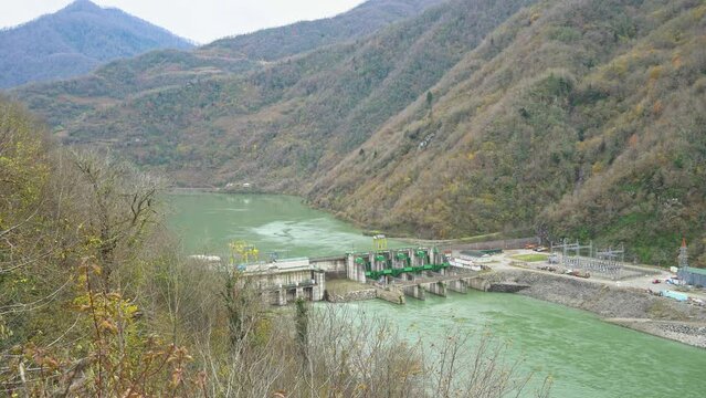 Hydroelectric power station is located at the mouth of the river between the mountains. Ajara Energy water power plant in Georgia. Green energy, renewable resources, environmental protection, ecology