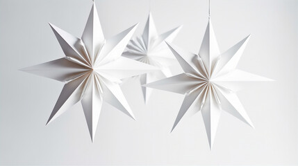 Obraz premium Paper Wonderland: Intricate Folded Decorations Capturing Christmas Spirit