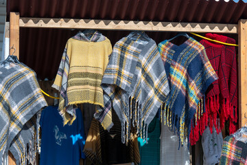 Pieces of wool clothing for sale in a flea market