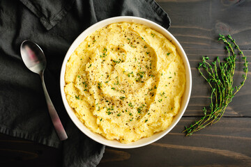 Roasted Garlic Mascarpone Mashed Potatoes with Fresh Thyme and Black Pepper: Mashed Yukon Gold...