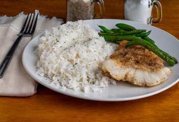 baked cod  with sauteed green beans and rice