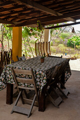 table and chairs in the farm house, table and chairs on the terrace, table and chairs, farm hotel, araruna
