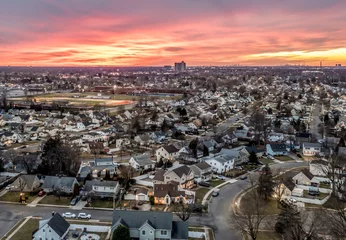 Fototapeten Long Island Nassau County at Aerial Sunset © Aurora East Media