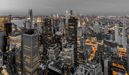 Lower Manhattan at twilight with black and gold - obrazy, fototapety, plakaty