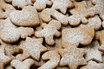 Christmas cookies with sugar powder. Gingerbread cookies close up