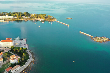 Panoramic aerial view of a picturesque island with a hotel near Porec, Croatia. A fragment of the...